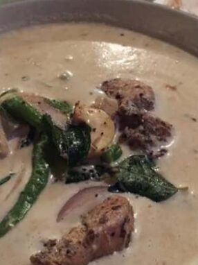 Kerala chicken stew with appam